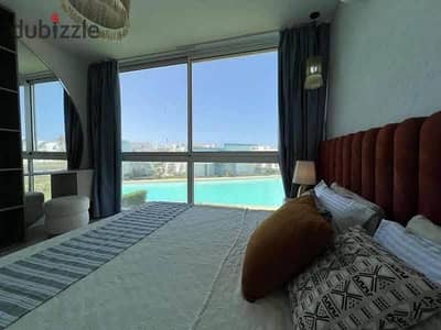 3BR chalet with panoramic open views first-row lagoon near delivery fully finished with ACs in North Coast near Dose Seashell Playa Marassi & Te