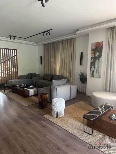 Corner villa with 5 bedrooms for sale in a prime location on Suez Road, next to Madinaty, The Spine Towers, Mountain View Aliva, and Sodic.