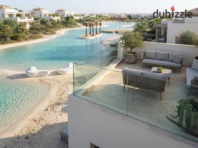 95m² first row lagoon chalet fully finished with ACs at Silver Sands North Coast installments near Almaza Bay Madin Beit El Bahr for sale