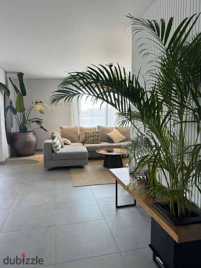 2 Bedroom apartment with a stunning double view 12-year installments or huge discount, on Suez Road minutes from AUC near Madinaty The Spine Tower