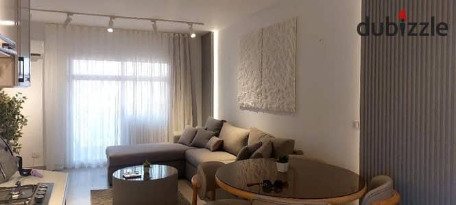 Fully finished apartment for sale with installments over 15 years and an immediate discount located on the Suez Road next to Sodic East la Vista Shoro