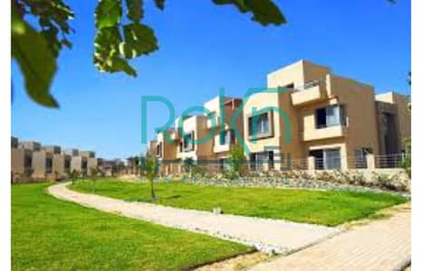 Town house for sale with open green area palm hills - golf extension
