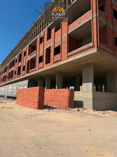 115 sqm, 3-bedroom apartment overlooking the pool at Hijaz Gate Compound. Super Lux finishing, Green Contract, 48-month installments.