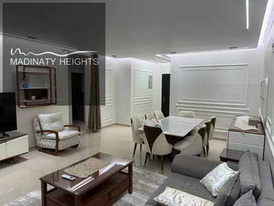 Furnished apartment for rent in Madinaty B8 Group 83 — Second floor 143 meters Wide garden view Special finishes Fully furnished with elegant furniture Qabani kitchen Fully air-conditioned Wi-Fi Minimum contract duration: one year 55,000 EGP Negotiable