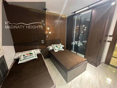 *Furnished apartment for rent in Madinaty - B12* Area / 78 meters Group 121 Prime location directly in front of the East Hub Finishing by the company with some modifications View of the street Fourth repeated floor consisting of 2 bedrooms and a fully furnished bathroom and devices Required / 30 thousand pounds Code of the advertisement / 12208