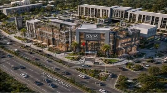 For Sale: 40 sqm shop at Mall NASA, directly on Al Wahat Road, opposite MSA University, with a 10% down payment and installments over 12 years