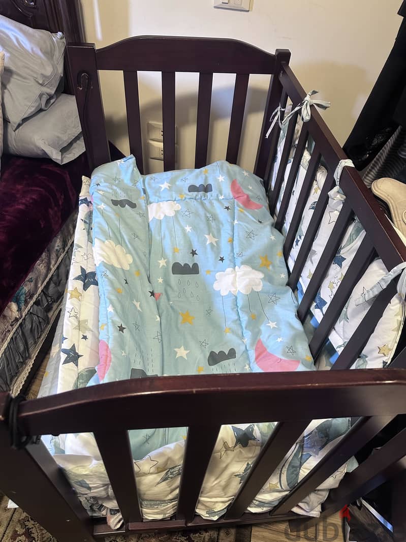 Used baby crib 4