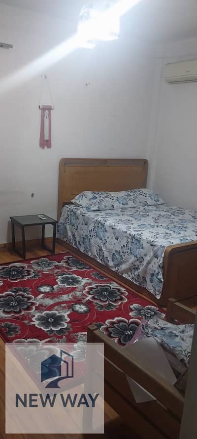 Apartment for rent near dokie under market price for a family and in khalf St last floor and AC and kitchen and furniture and applianbut not alevitor