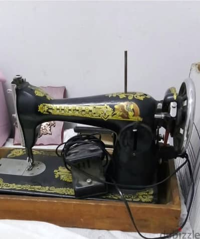 مكينه خياطه سنجر