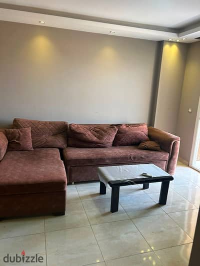 For rent furnished in Madinaty an apartment of 96 meters fully air-conditioned with natural gas and a master room uninjured at all