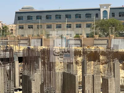 Ground Apartment with Garden for sale with installments, Near Delivery, in West Clay Compound in Fron of Mall of Arabia, 152 M, in 6th of October City
