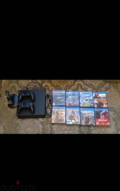 PS4 slim + 2 original controllers + 8 discs
