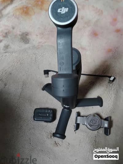 فرصه لعدم الاستخدام والسرعه البيع حامل dji 7p osomo وارد الخارج بكامل