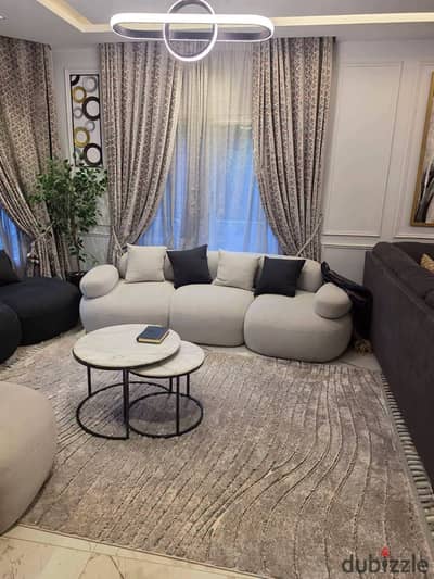 For_Sale in Madinaty (Al Rehab): Townhouse with custom finishes, a garden view, and a north-facing orientation. Located just steps away from the Ahmed