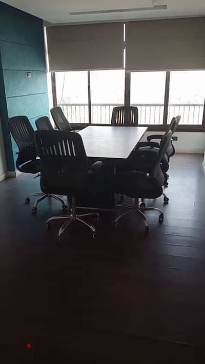 Fully furnished and equipped office at the Hunting Club, 220m, luxurious entrance, elegant building, distinctive address, fully air-conditioned, super lux finishing, overlooking the Hunting Club