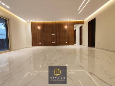 Unfurnished ground-floor apartment for rent with a private garden, brand new and never occupied, featuring Super Lux finishing. Prime location next to
