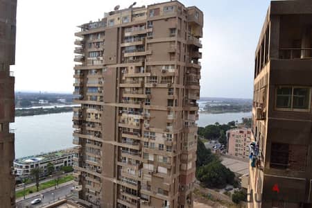 Your apartment on the Nile direct two rooms next to the Hussein Sadqi Mosque in a very upscale tower the literal meaning of the word 'catch'