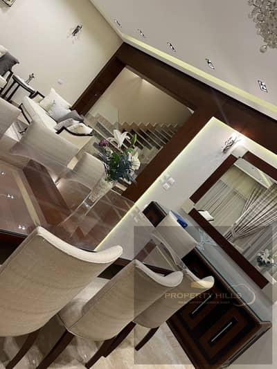 تاون هاوس كورنر 5 غرف للبيع في Palm Hills Golf Extension (Woodville)، مدينه 6 أكتوبر | تشطيب فاخر | على اللاندسكيب مباشرة