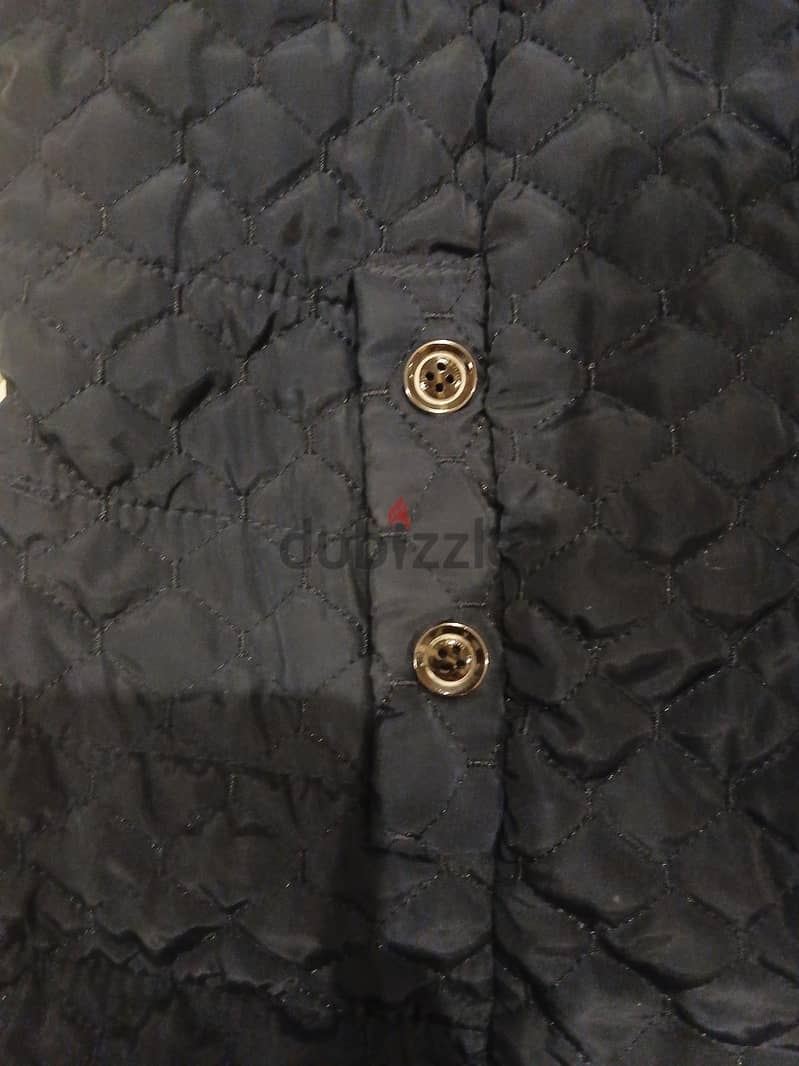 sleevles puffer hooded jacket 1