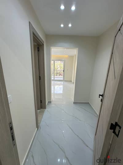 Directly on the Suez Road and next to Madinaty an apartment for sale with super deluxe finishes in Mostakbal City next to Sarai