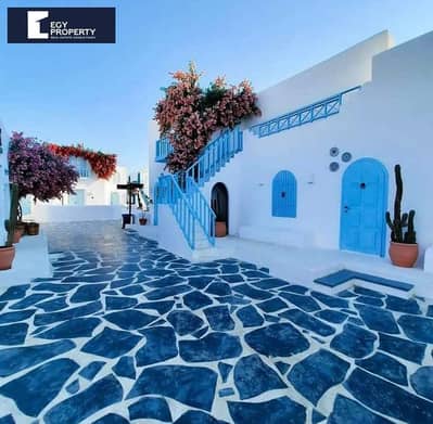توين هاوس للبيع بالفرش في ماونتين فيو راس الحكمة الساحل الشمالي جاهز للسكن والمعاينة