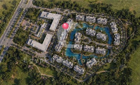 Writing 103 sqm apartment for sale in Tesla Island Compound, Al Wahat Road, opposite Misr University. 10% down payment, installments up to 12 years.