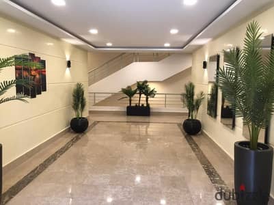 Apartment for sale in Green 5 Compound; north-facing, semi-finished (with plumbing and electrical infrastructure installed), available for installment