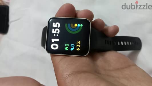 Redmi Watch 2 Lite + ساعة ديجيتال للبيع — محتاجة تغيير بطارية