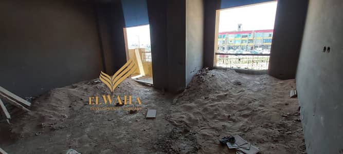 Apartment for sale in Badr City, the distinguished neighborhood, directly in front of Egypt Mall, first row, semi-finished