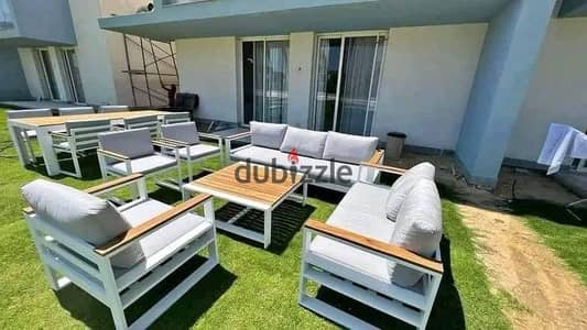 Chalet for sale 140m first row on lagoon fully and Ultra Super Lux finishing inNew Alamein a distinctive location and guaranteed investment with installments and flexible payment plan