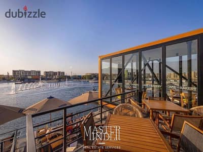 Apartment with the best price For Sale over looking swimming pool view fully finished with kitchen and AC's and ready to move in Mivida New Cairo