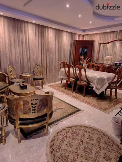 Apartment for sale on the ground floor with a private garden, Zayed 5, prime location