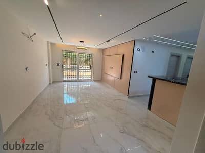 Ground floor apartment with a garden and special finishing for sale in Madinaty