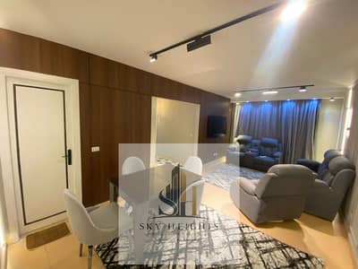 Two-bedroom ground-floor apartment with private garden for rent, furnished, in Madinaty
