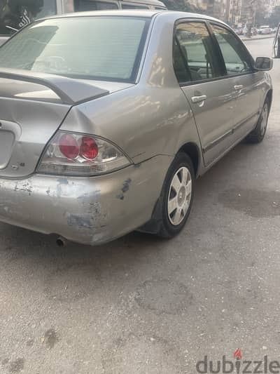 ميتسوبيشي لانسر 2005 نص رياضبه