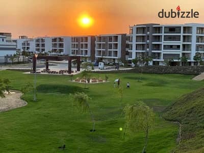 Apartment with garden for sale in a prime location in Taj City, directly opposite Cairo Airport, minutes from Heliopolis and Sheraton.