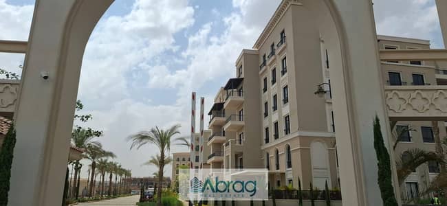 Two-bedroom apartment for rent in Village West, Sheikh Zayed, with air conditioning, prime location.