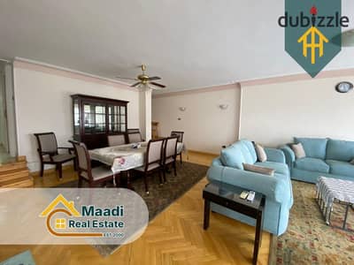 Modernly furnished apartment in the heart of Sarayat El Maadi—on the area's most prestigious street—featuring 24-hour security and guards.