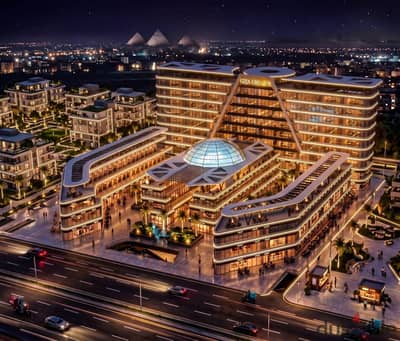 For sale shop with an area of 20m, in front of Giza Crown Tower, view of the Pyramids, in the heart of October Gardens, Italian district, down payment is lower and the longest repayment period.