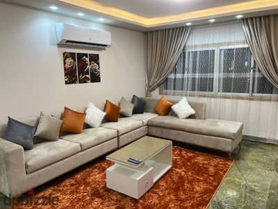Furnished, air-conditioned hotel-style apartment next to City Stars, available for daily and monthly rent for families. Excellent location in Nasr Cit