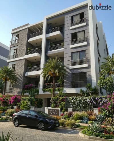 Next to JW Marriott hotel and facing Cairo Airport own an apartment for sale in Taj City best phase next to Taj Sultan and near North Rehab