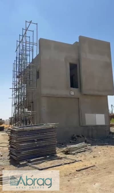 60 sqm apartment for sale in the Rafts compound, Sheikh Zayed (Dahshur Link Road); prime location, 8-year installment plan available.