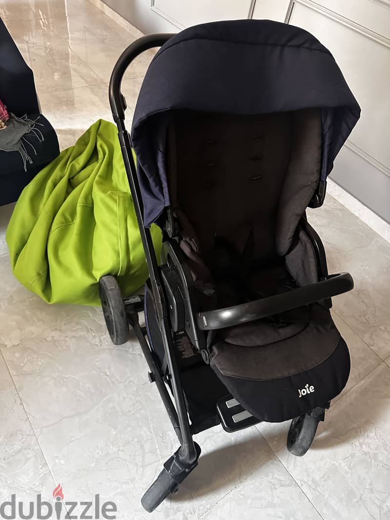 Navy blue stroller and bassinet 2