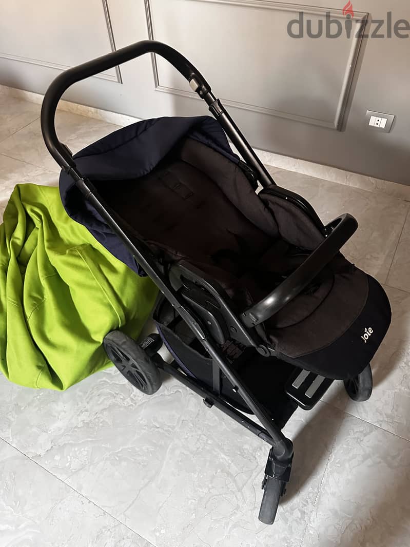Navy blue stroller and bassinet 3