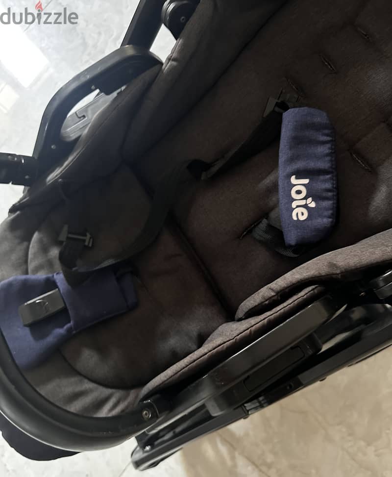 Navy blue stroller and bassinet 4
