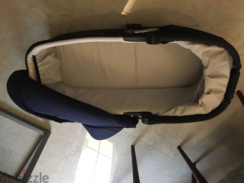 Navy blue stroller and bassinet 9