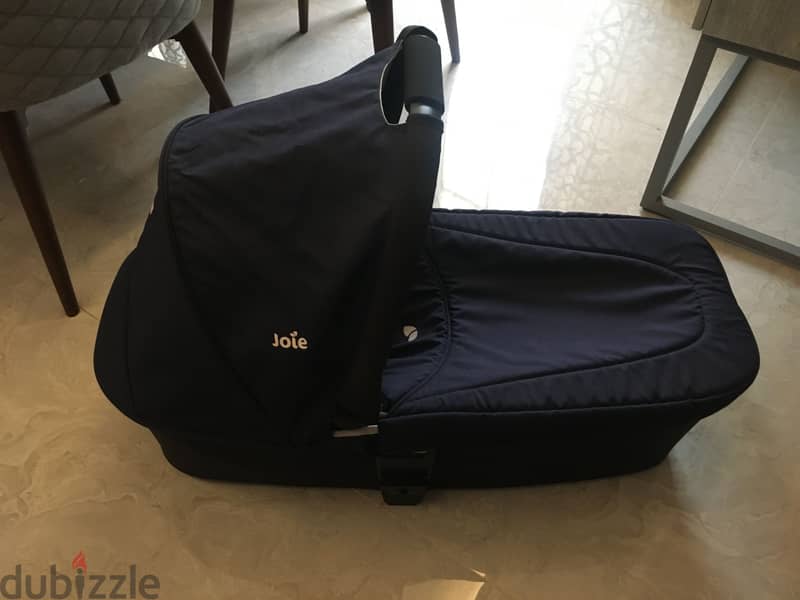 Navy blue stroller and bassinet 10
