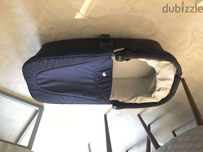 Navy blue stroller and bassinet 11