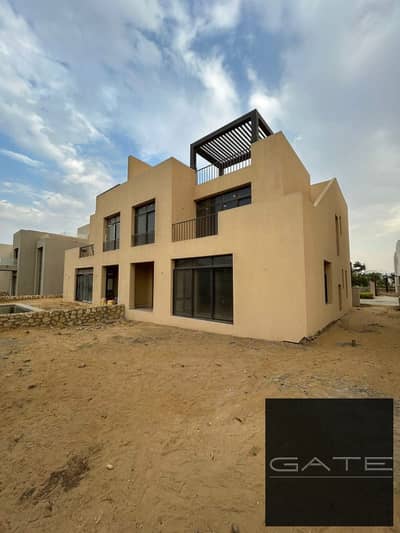 Standalone villa for sale at a special price in O West Compound – 6th of October, Type B – Open view of a spacious landscape – Immediate delivery
