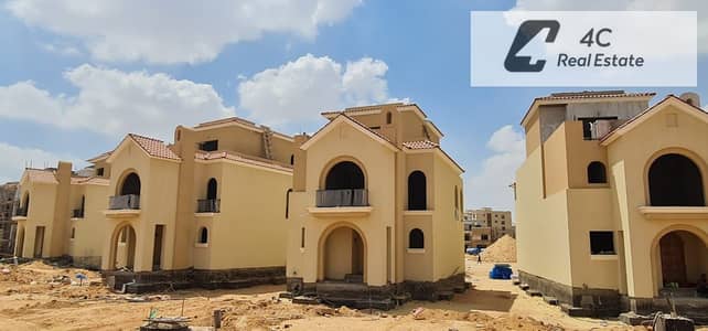 villa with down payment and installments lagoon and landscape view resale below market price in Sarai New Cairo near Madinaty for sale